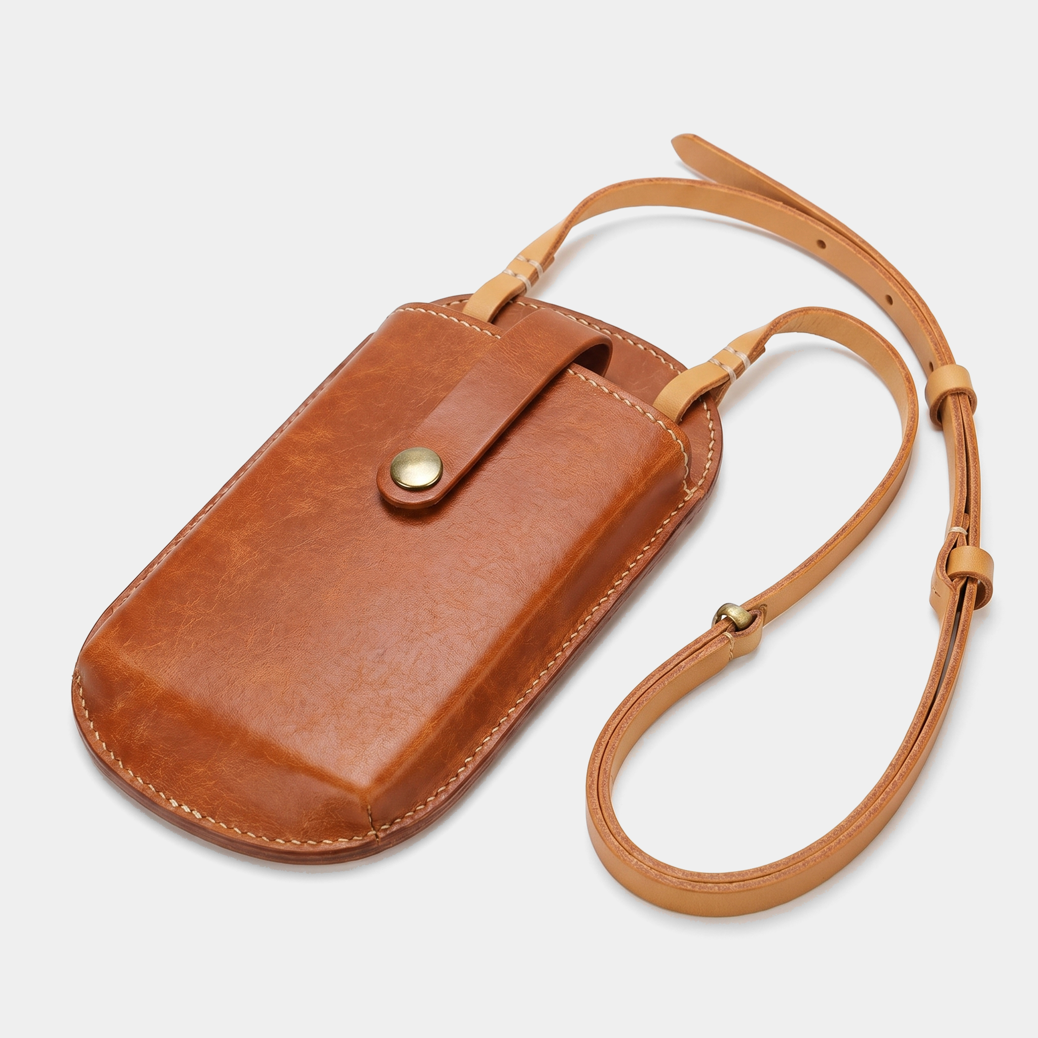 Honey tan leather phone crossbody bag with adjustable strap