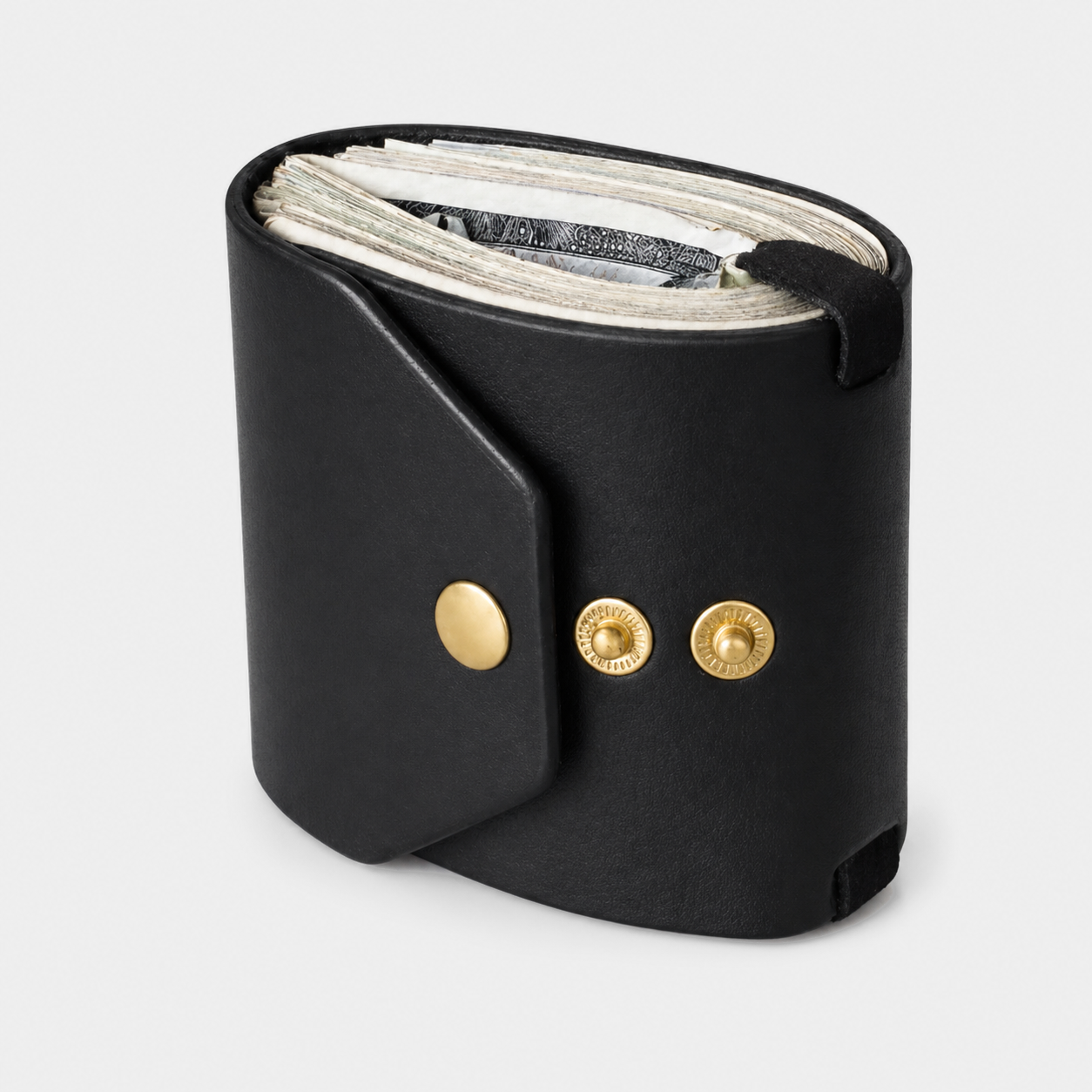 Black leather cash roll wallet with gold snap buttons on light gray background